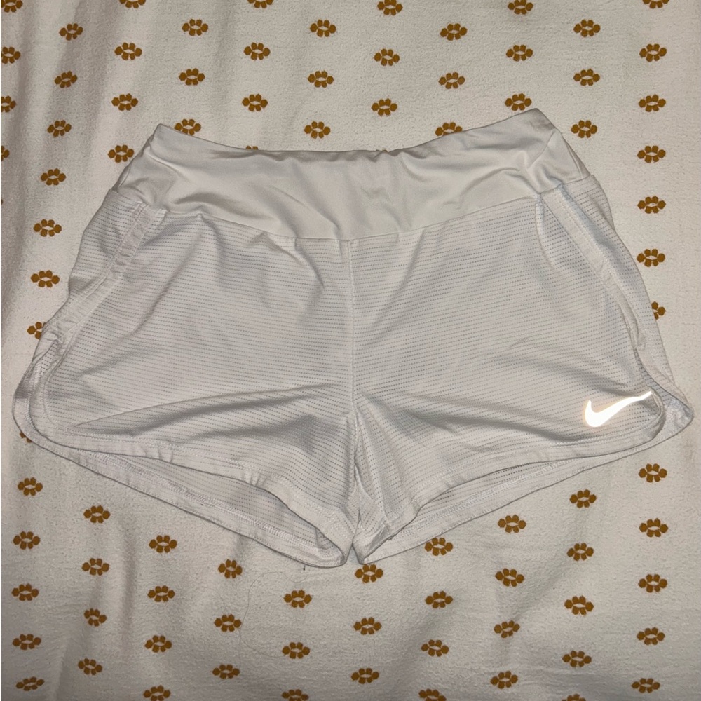 Small, white Nike Dry-Fit shorts